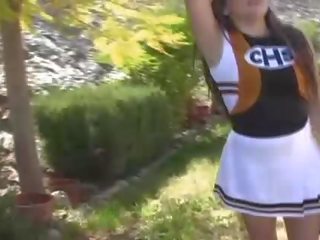 Michelle gorgeous brunette cheerleader babe flashing tits and ass and pussy