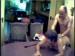 Mature couple fucked on the dining table Video
